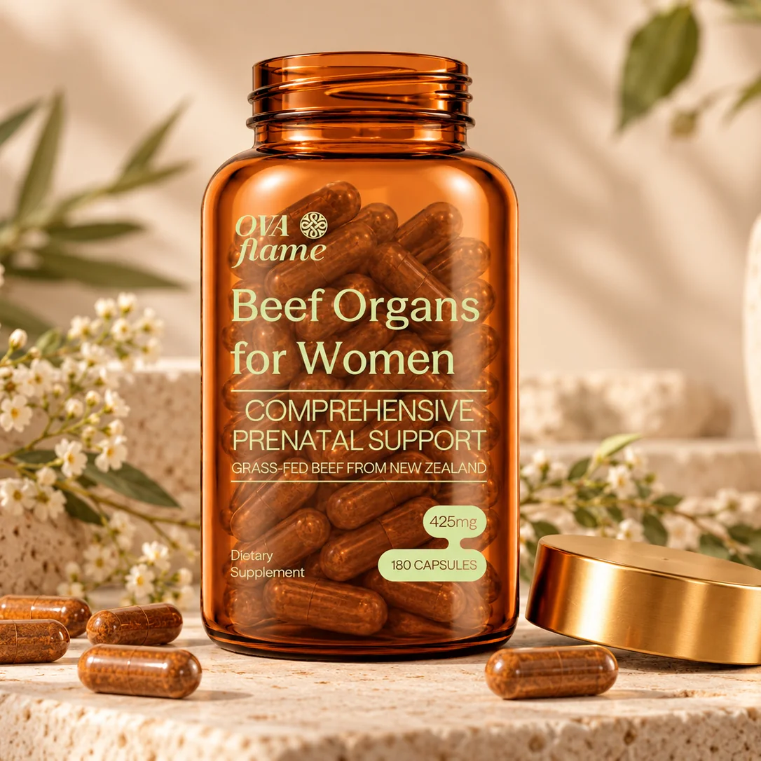 OVA flame Comprehensive Prenatal Support – amber glass bottle, open, gold lid beside it, white flowers