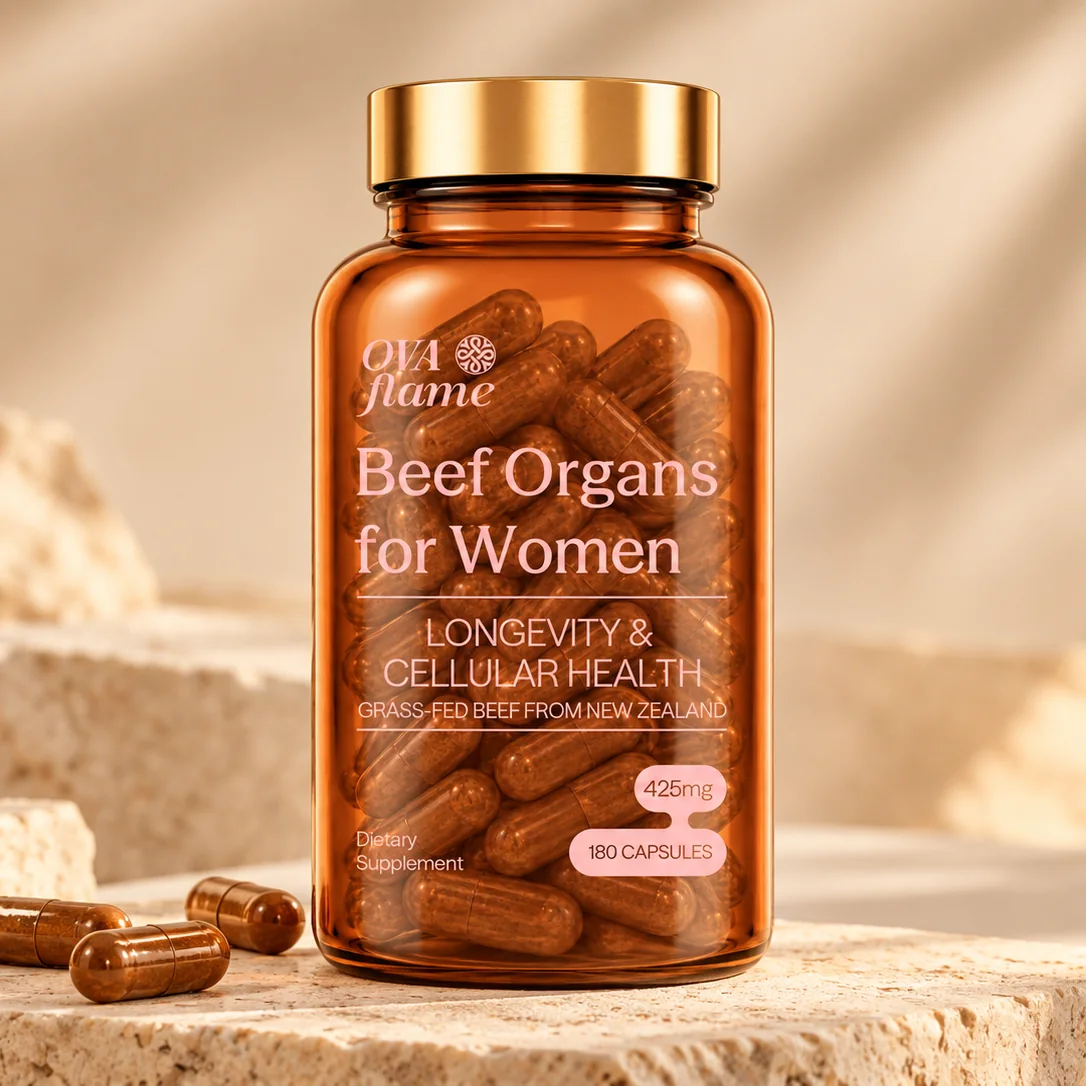 OVA flame Longevity & Cellular Health – amber glass bottle, closed, capsules on travertine