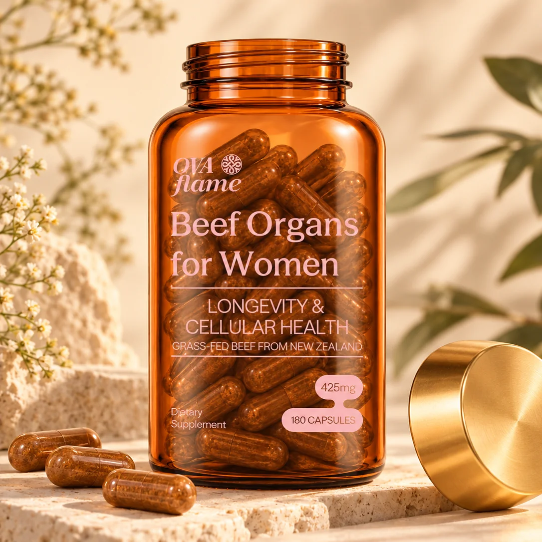 OVA flame Longevity & Cellular Health – amber glass bottle, open, gold lid beside it, flowers